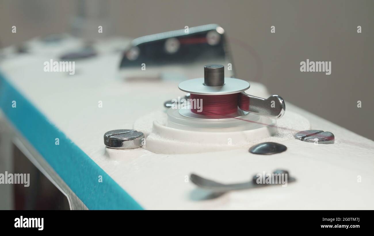 Shooting of spinning bobbin of thread, closeup photo Stock Photo Alamy