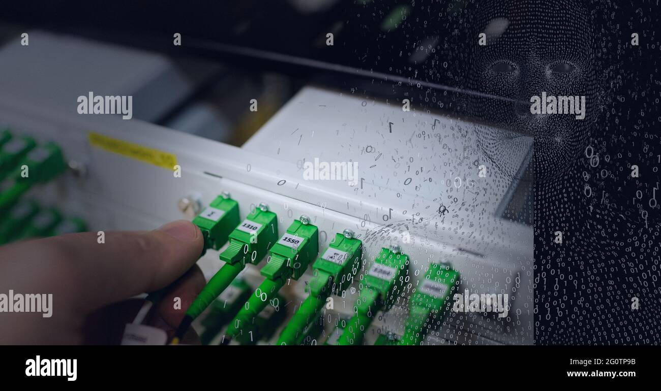 Composition of exploding human bust formed with binary coding and computer server Stock Photo