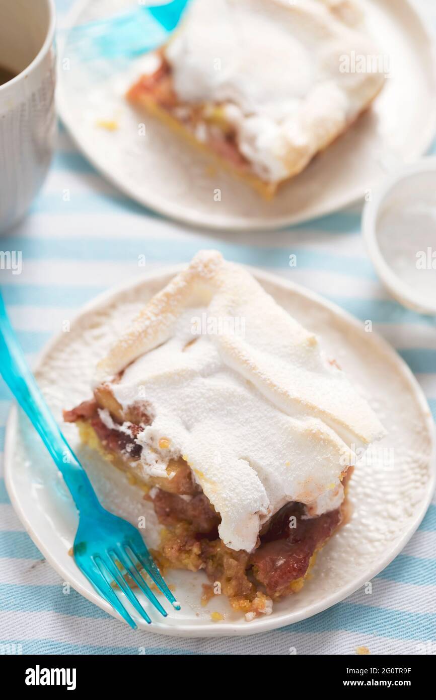 Rhubarb shortcrust cake with meringue on top Stock Photo