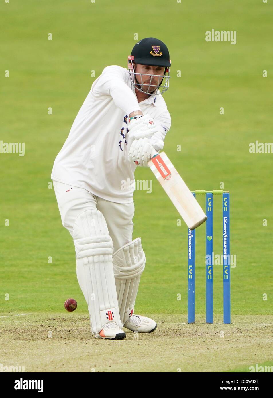 Former cricket player Ali Kabir holding the number 33 shirt when he signed  for Hampshire during the 2010- 12 season Stock Photo - Alamy