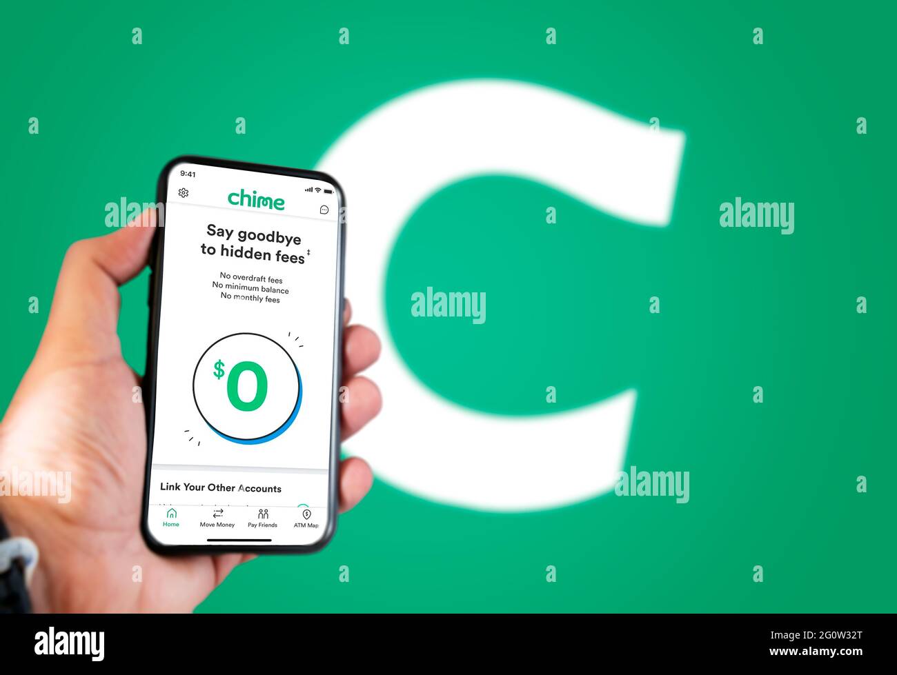 San Francisco, Ca, USA, May 2021: A hand holding a phone with the Chime app on the screen. Chime is an American financial technology company which pro Stock Photo