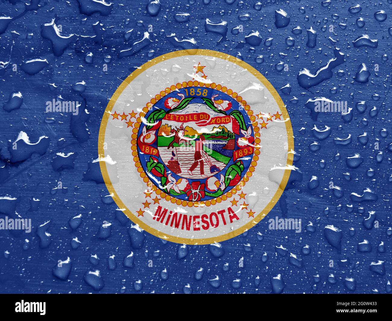 flag of Minnesota, USA with rain drops Stock Photo