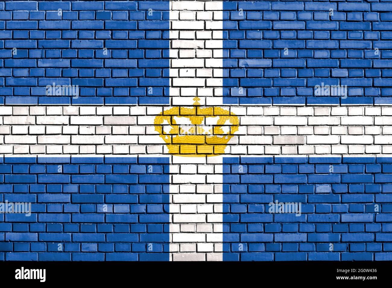 historical Kingdom of Greece flag on brick wall Stock Photo