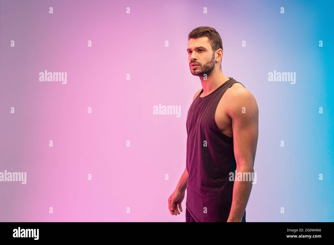 Focused bearded european young man in studio Stock Photo