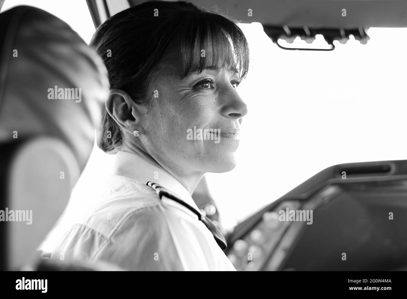 JOHANNESBURG, SOUTH AFRICA - Jan 06, 2021: Johannesburg, South Africa - May 08 2012: British Airways Middle Aged Female Captain Pilot in an Airplane c Stock Photo