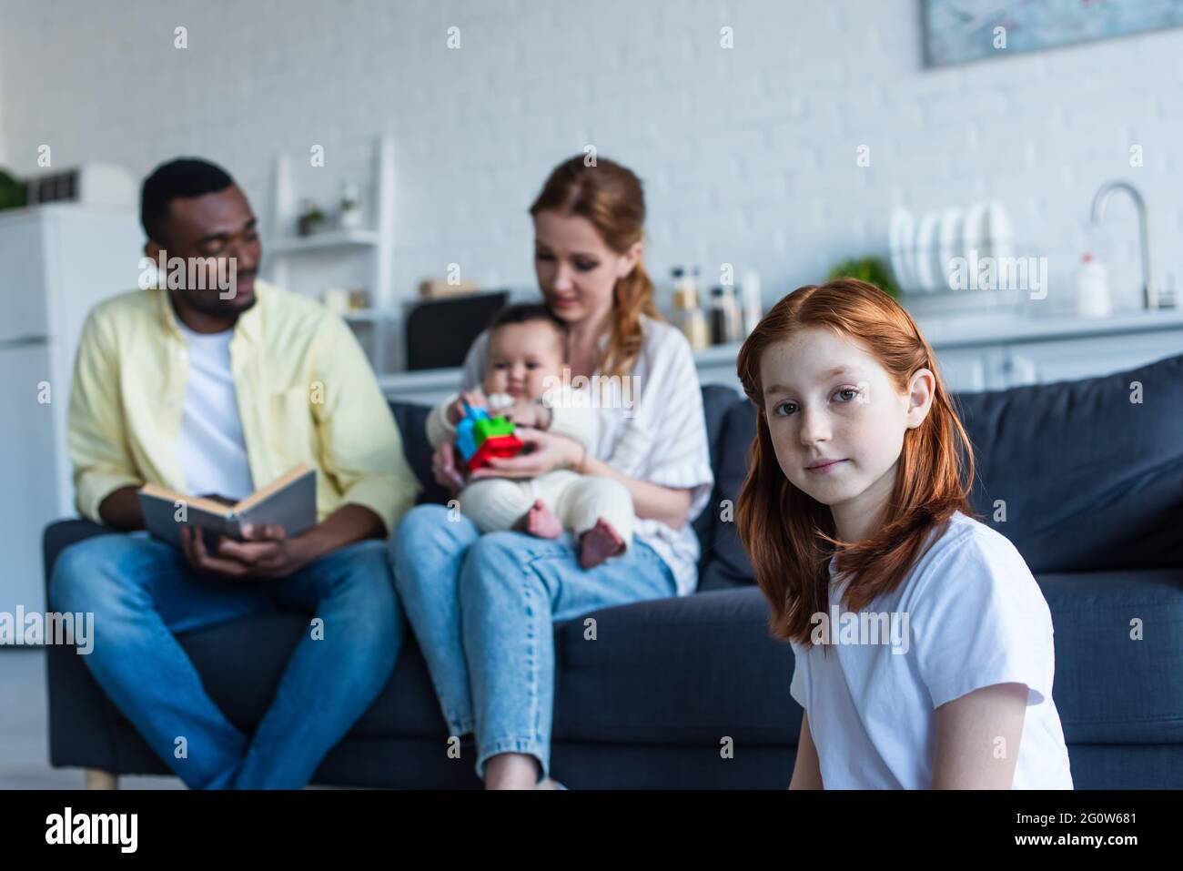 Preteen girl on sofa hi-res stock photography and images - Alamy