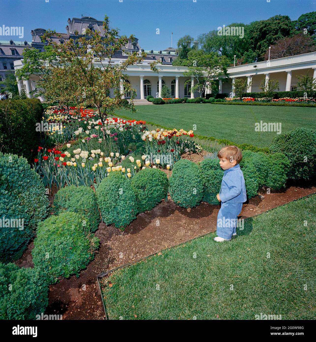ST-C112-1-63                               26 April 1963  John F. Kennedy, (JFK, Jr.), in the Rose Garden  Please credit 'Cecil Stoughton. White House Photographs. John F. Kennedy Presidential Library and Museum, Boston' Stock Photo