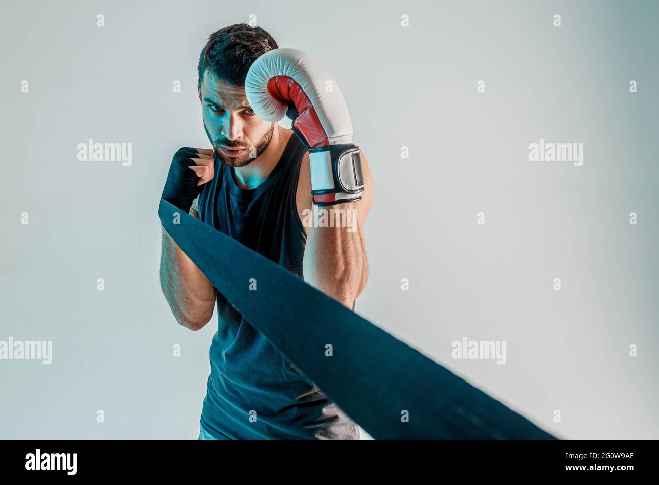 Boxer with boxing bandage and glove on hands Stock Photo