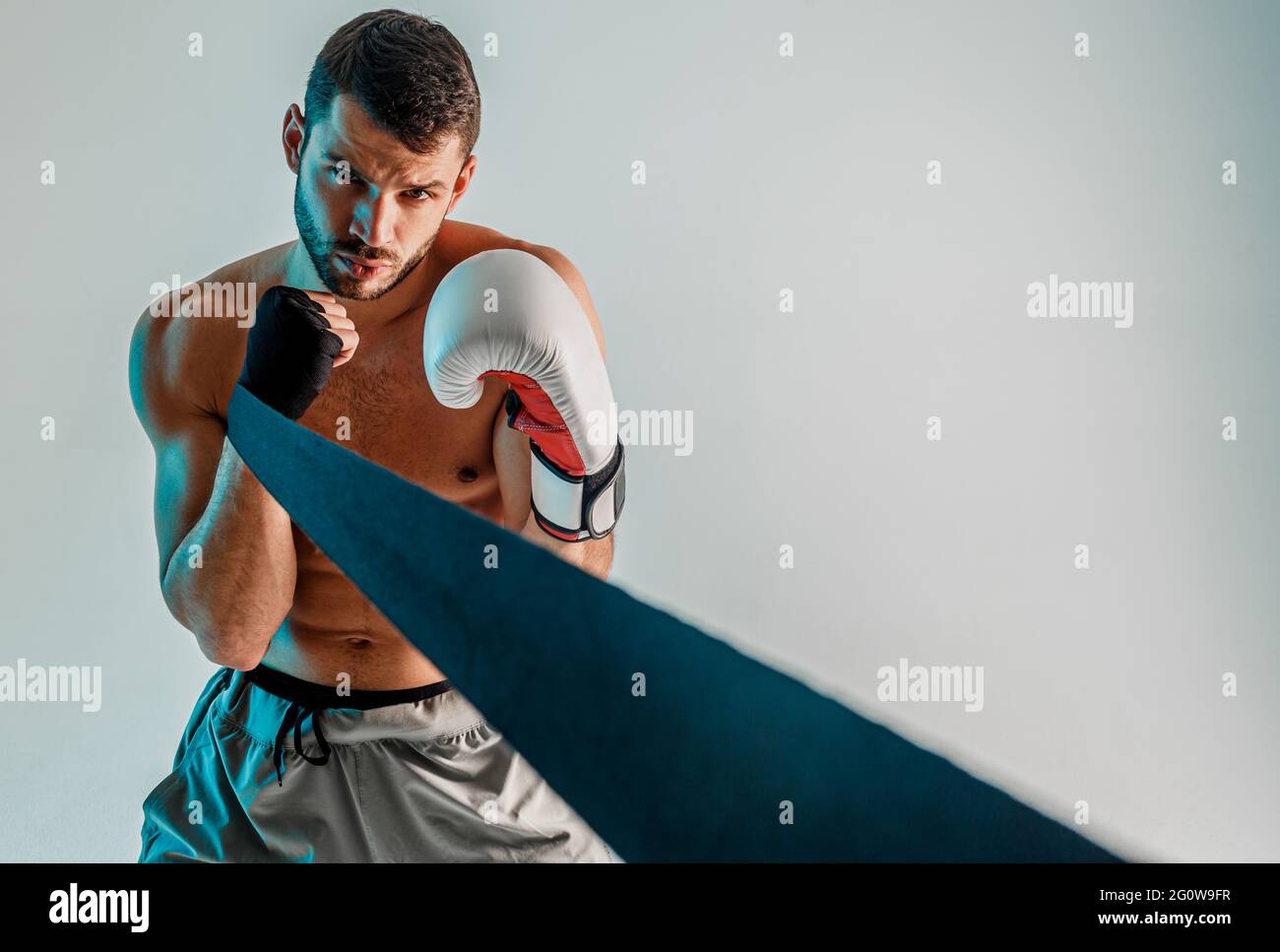 Boxer with boxing bandage and glove on hands Stock Photo