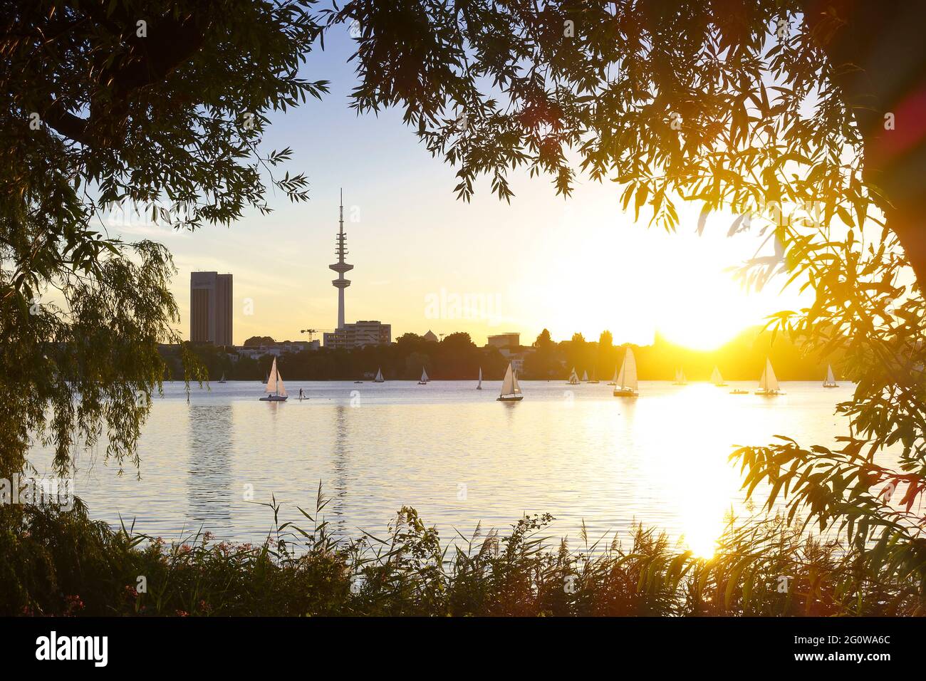 Outer Alster lake Aussenalster in Hamburg, Germany, during sunset on a warm and beautiful summer evening. Stock Photo