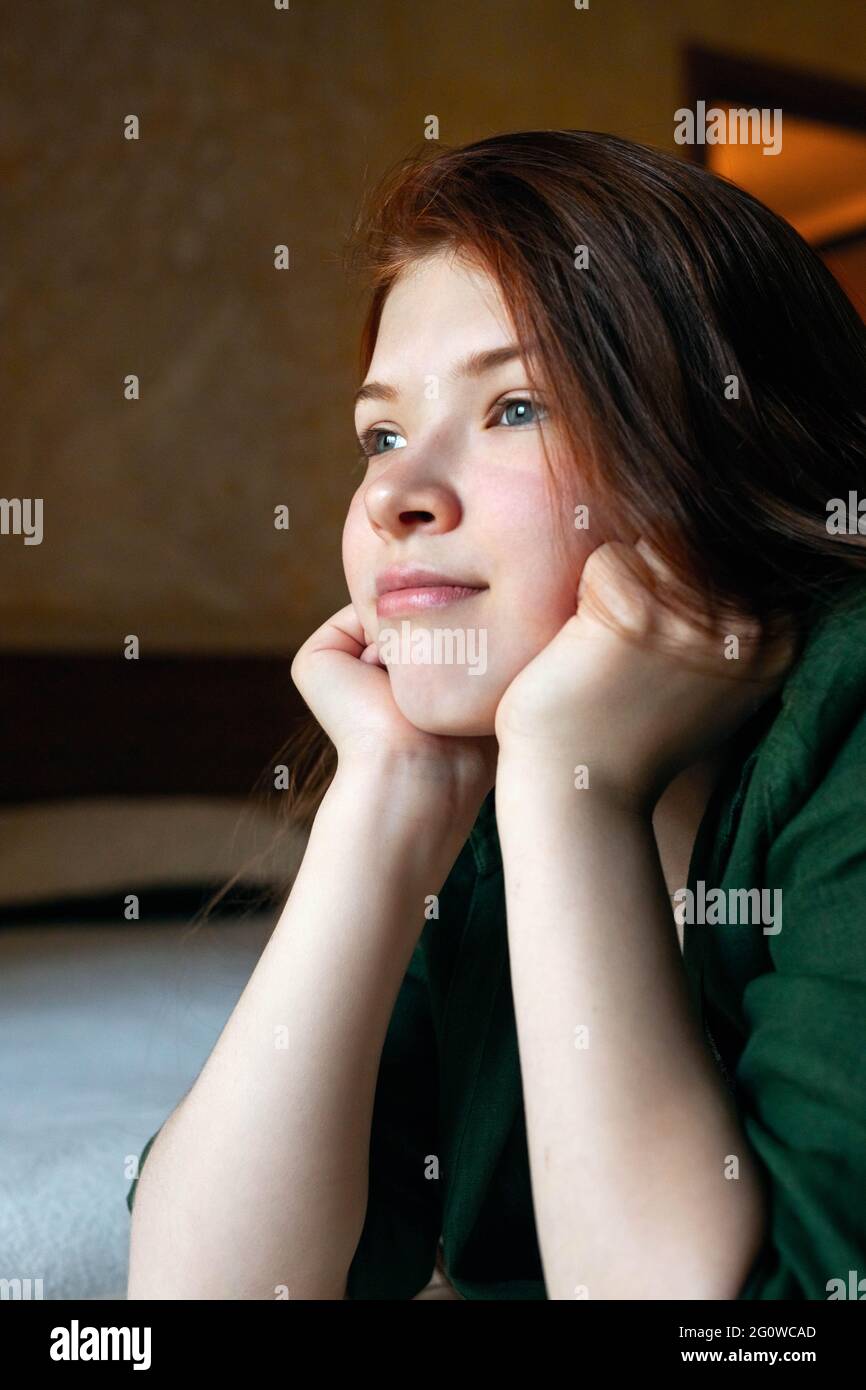 vertical portrait of happy redhead teenage girl Stock Photo