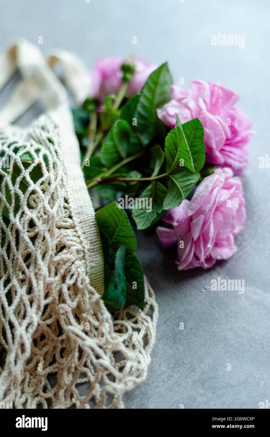 a bouquet of flowers in an eco-bag Stock Photo