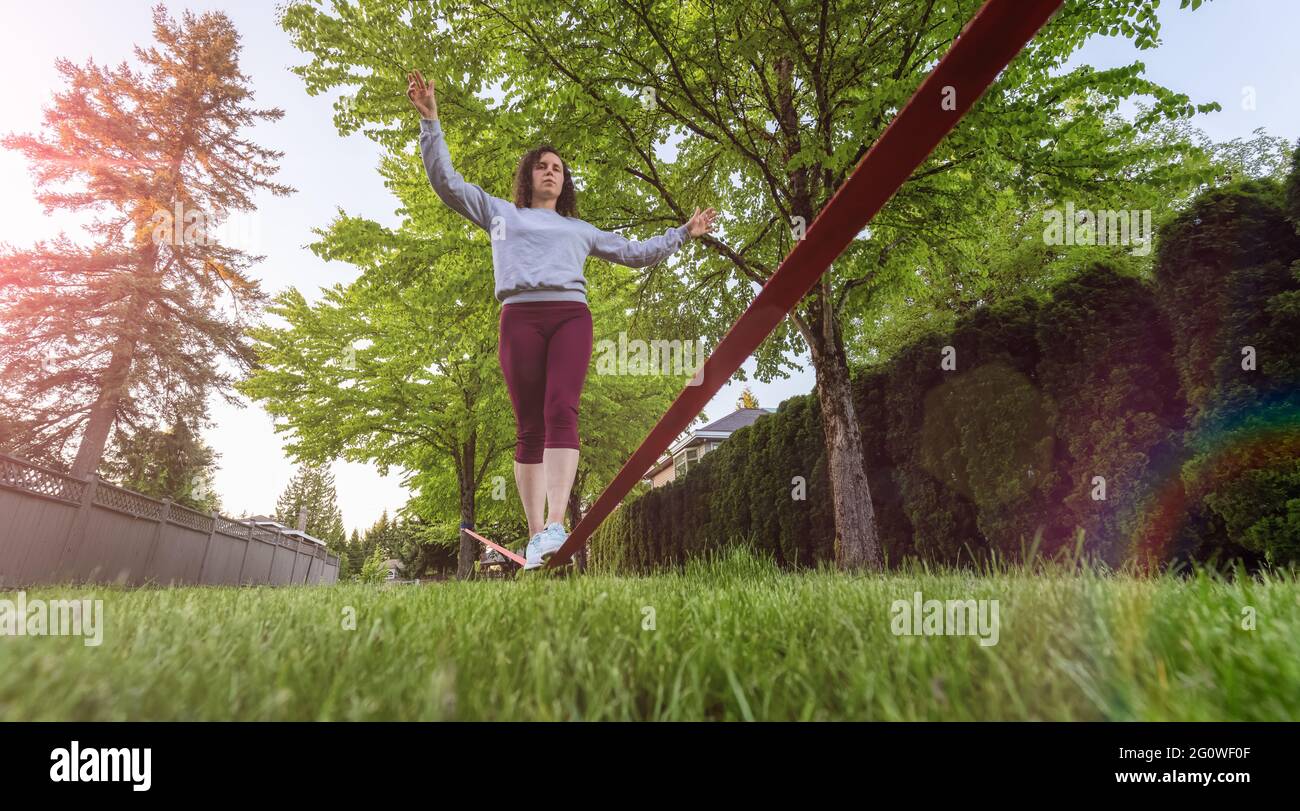 Tightrope walker woman hi-res stock photography and images - Page 2 - Alamy