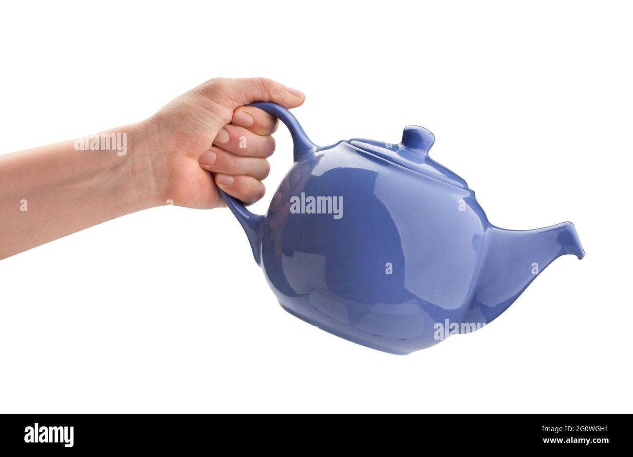 ceramic kettle in hand path isolated on white Stock Photo