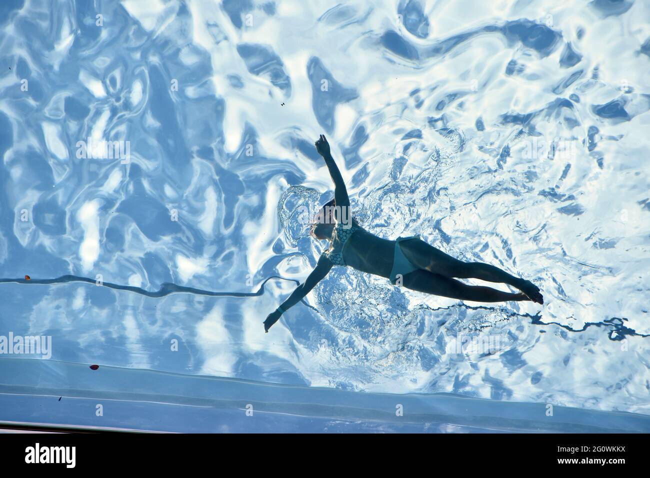 London, UK. 3rd June, 2021. Embassy Gardens sky pool at Vauxhall on sunny day. Credit: JOHNNY ARMSTEAD/Alamy Live News Stock Photo