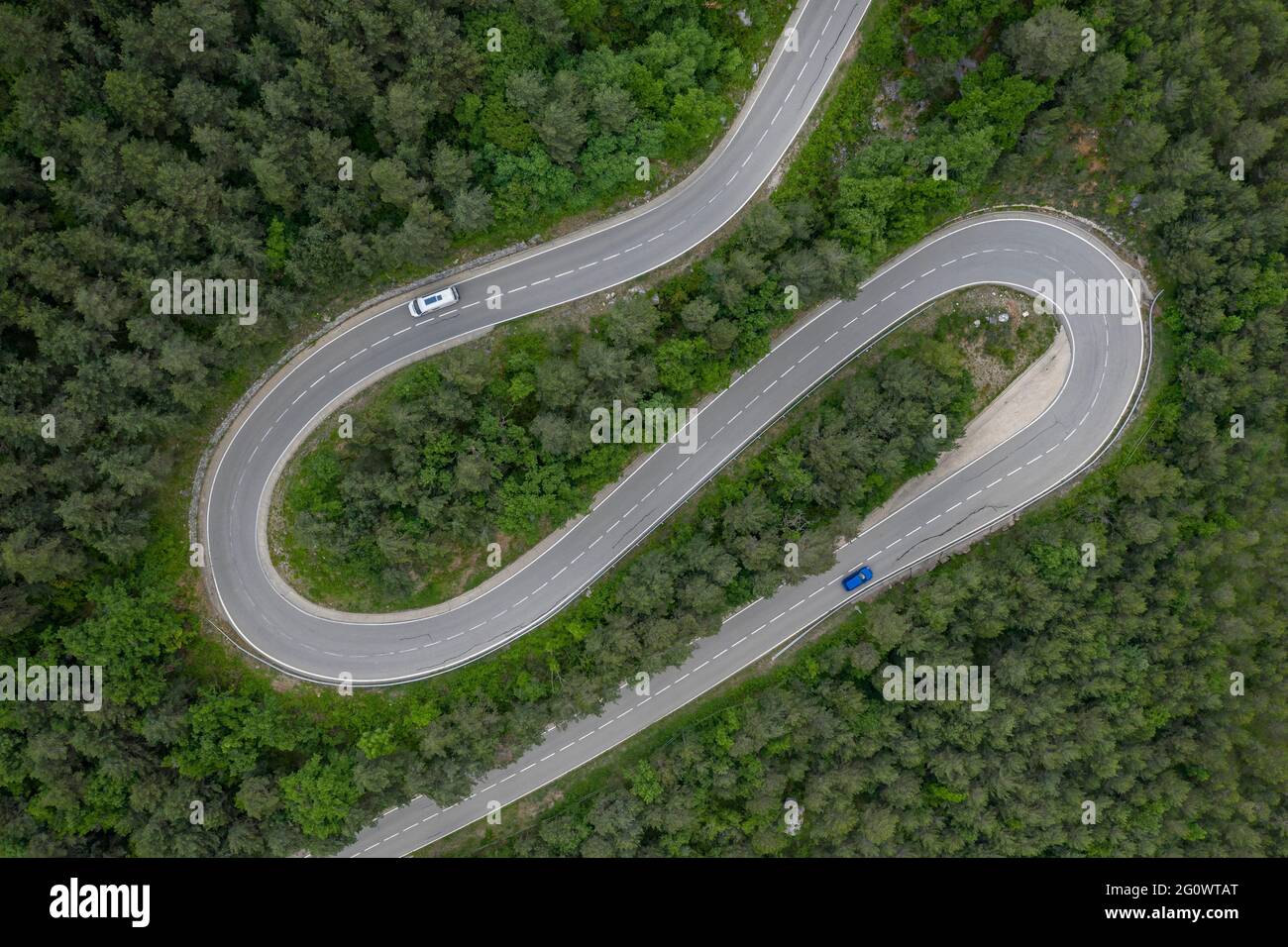 Aerial overhead view of a curvy road that goes to Saldes and Pedraforca mountain (Berguedà, Catalonia, Spain) Stock Photo