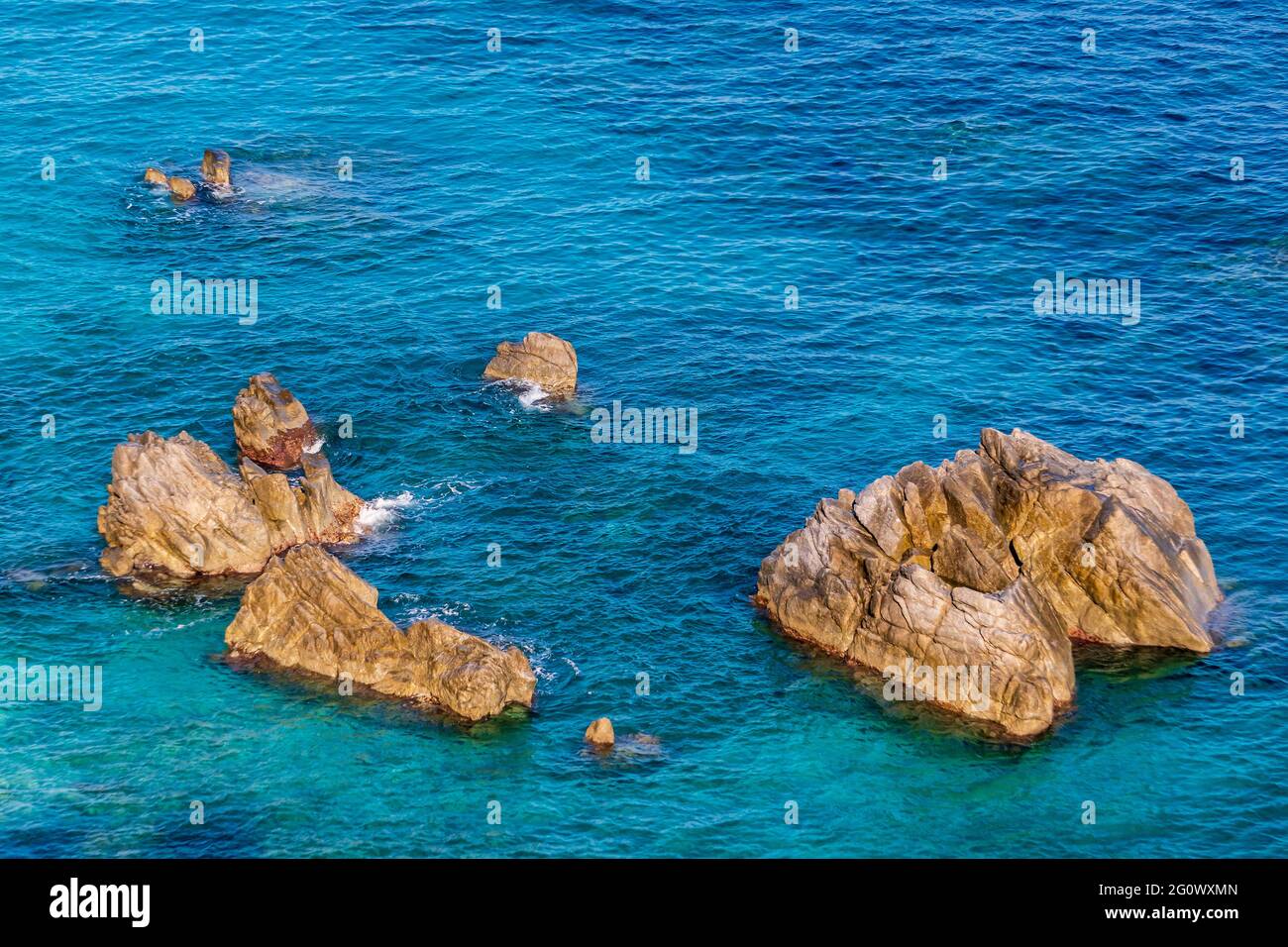 The rock and cobalt blue sea of Tropea, Italy. Tropea as a popular tourist destination in Calabria, Italy. Stock Photo