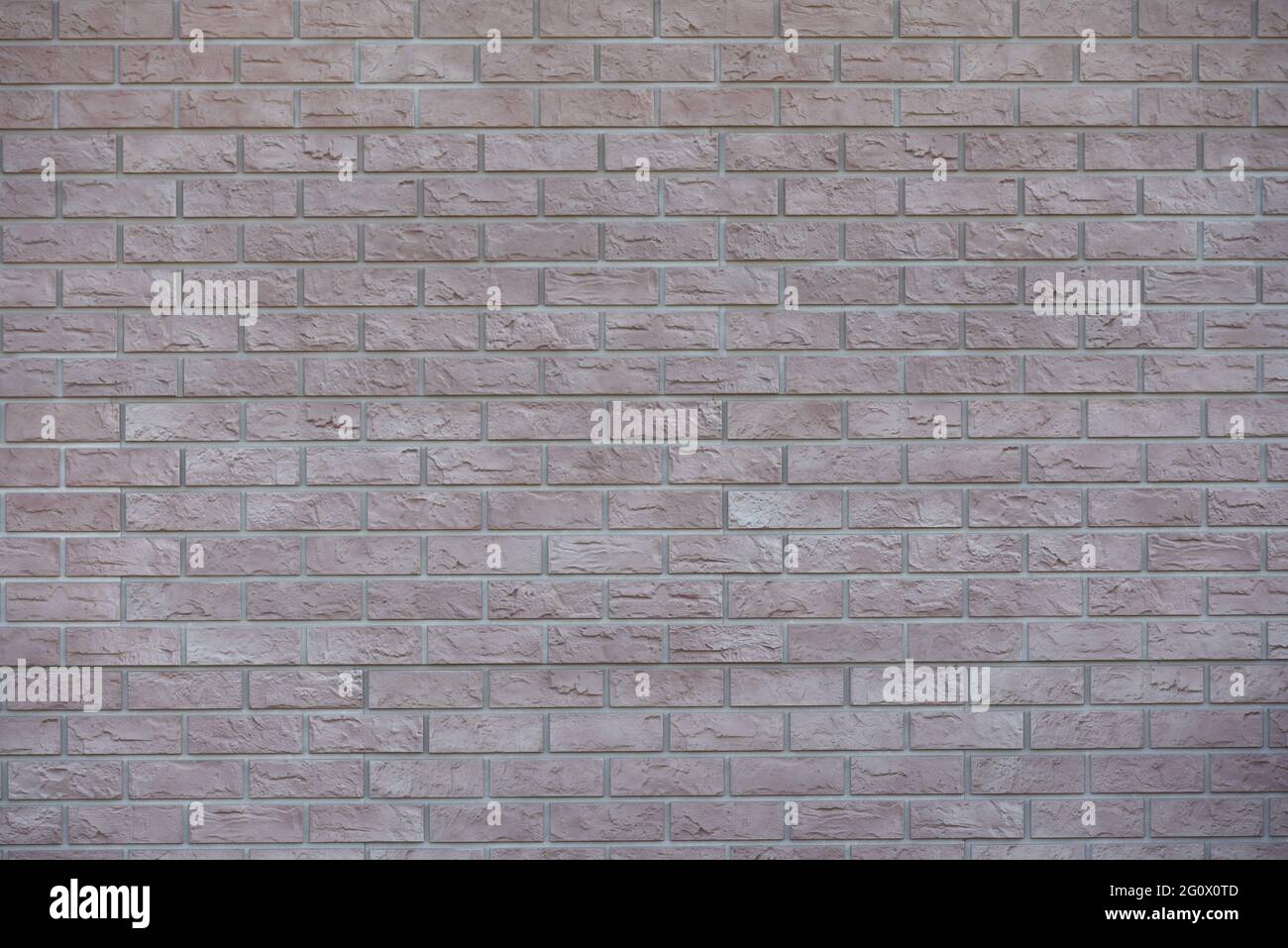 Texture brick wall from plastic panels for facade decoration Stock Photo