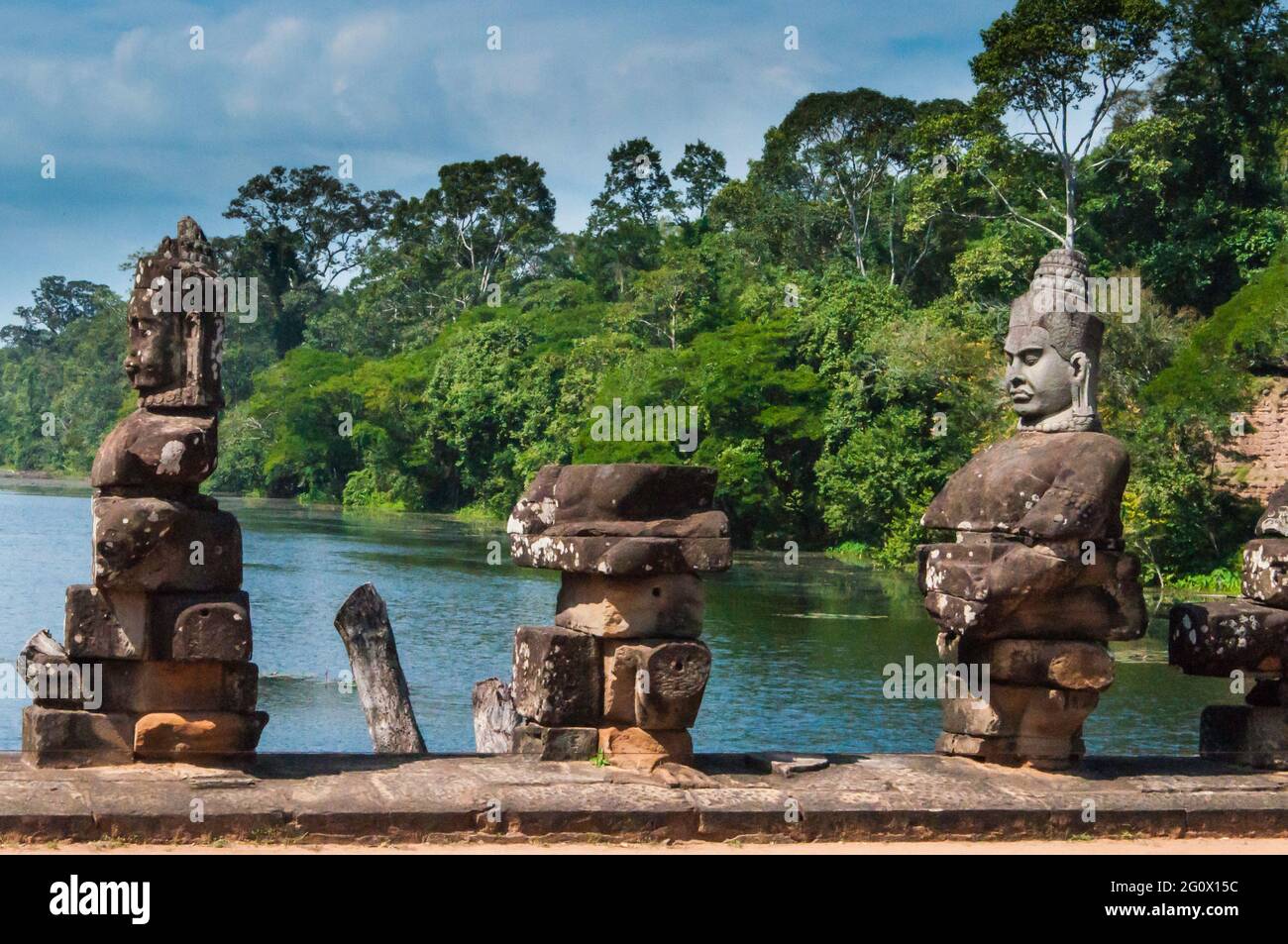 Statues of devas on the bridge to Angkor Thom. in Cambodia Warriors and ...