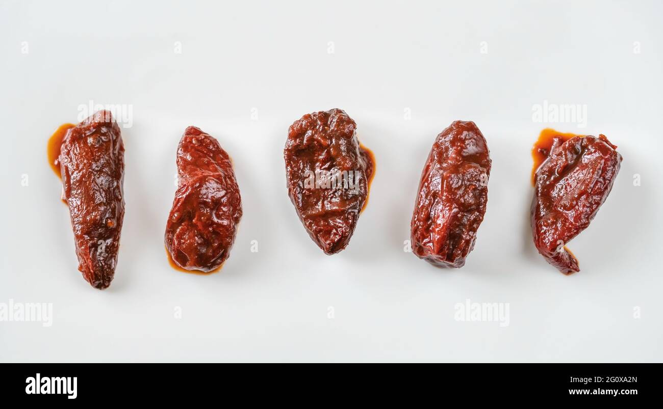 Canned chipotles in adobo sauce isolated Stock Photo Alamy