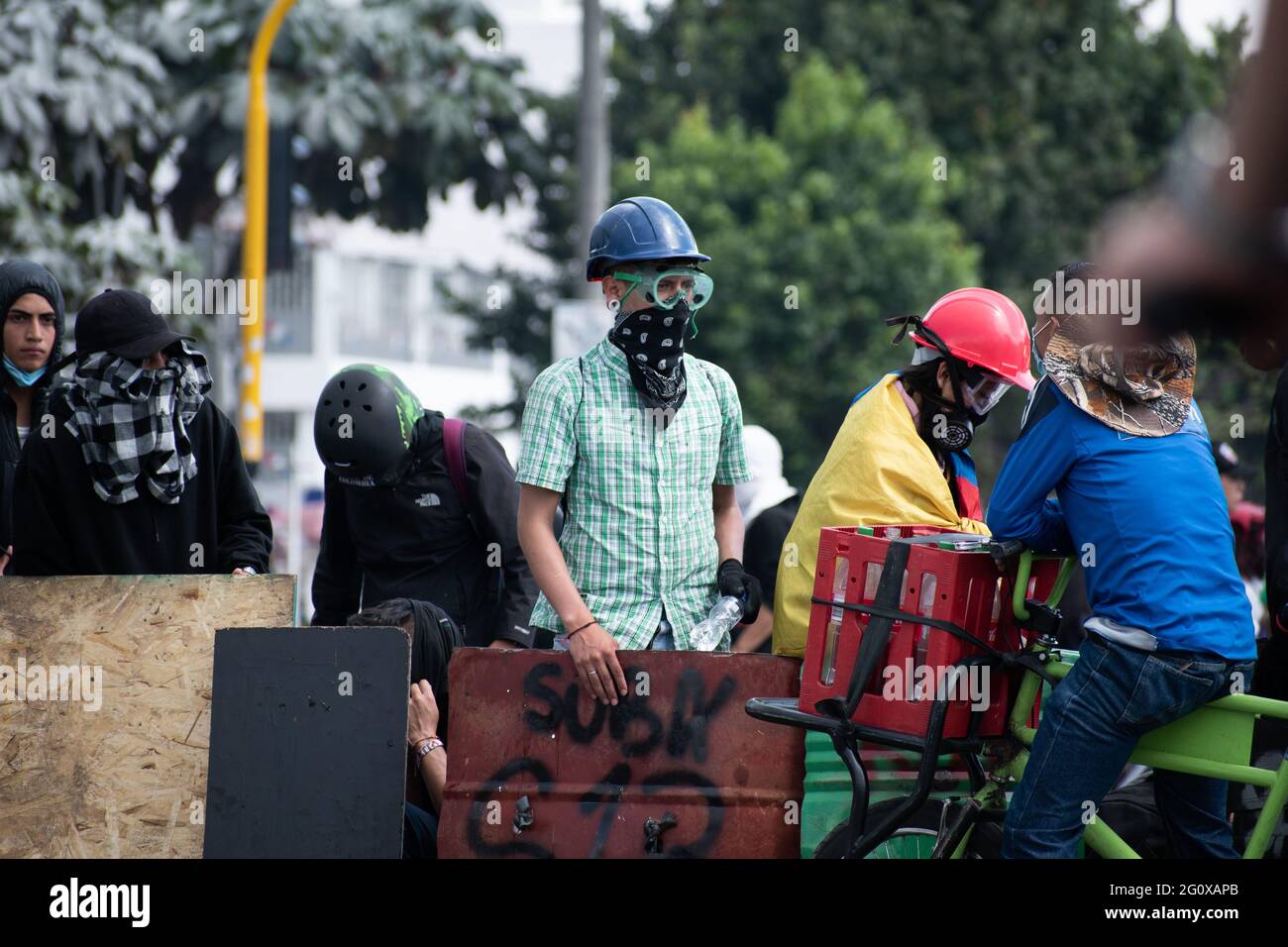 Bogota, Colombia. 02nd June, 2021. members of the so-called front line hold shields on a new day of anti-government protest in Bogotá, Colombia against the government of President Iván Duque and police brutality on June 2, 2021 Credit: Long Visual Press/Alamy Live News Stock Photo