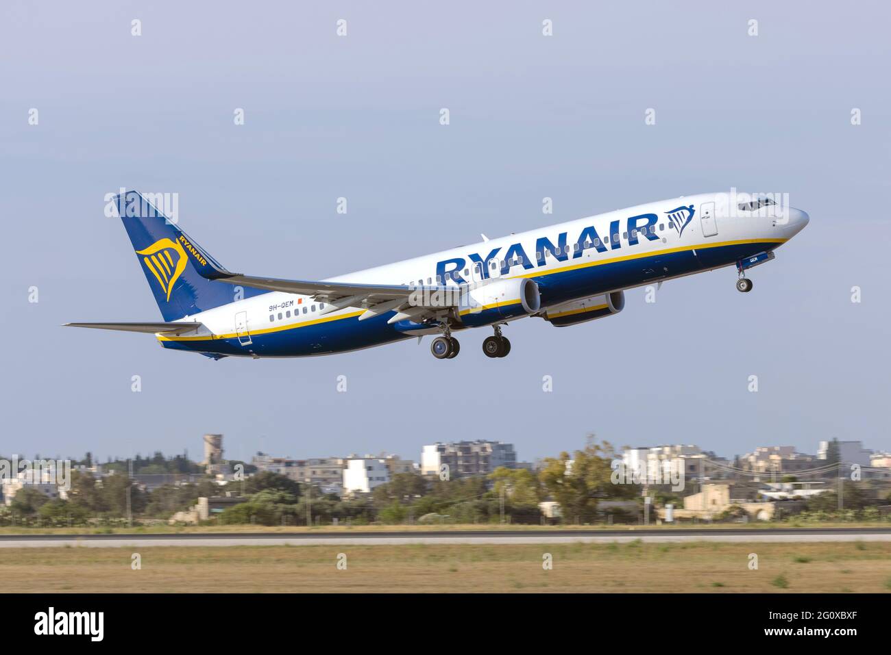 Ryanair (Malta Air) Boeing 737-8AS (Reg: 9H-QEM), one of several Maltese Registered Ryanair 737's departing runway 13. Stock Photo