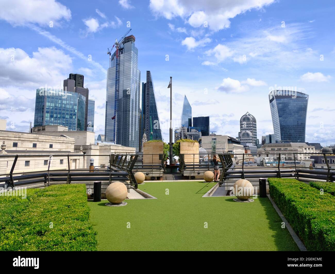 London, UK. A view of the City of London skyline as seen from the terrace of Coq D'Argent Stock Photo