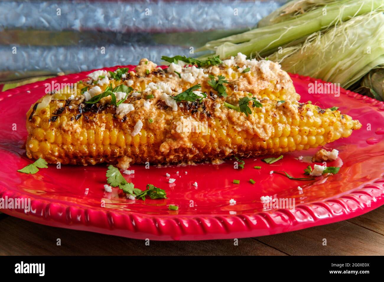 Mexican street corn also known as elote served with chili mayonnaise