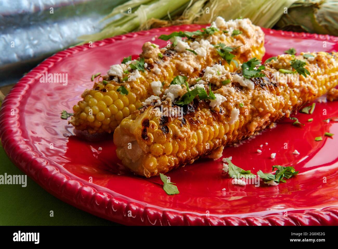 Mexican street corn also known as elote served with chili mayonnaise