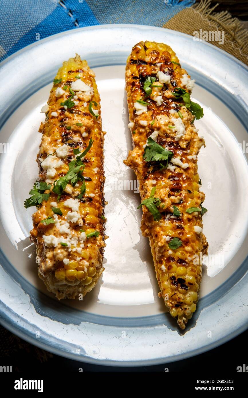 Mexican street corn also known as elote served with chili mayonnaise