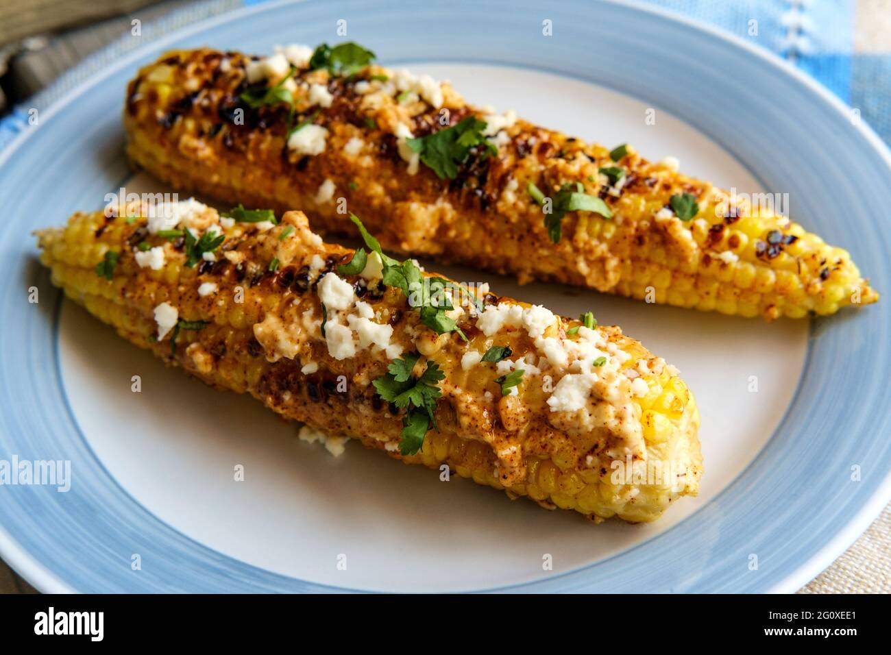 Mexican street corn also known as elote served with chili mayonnaise