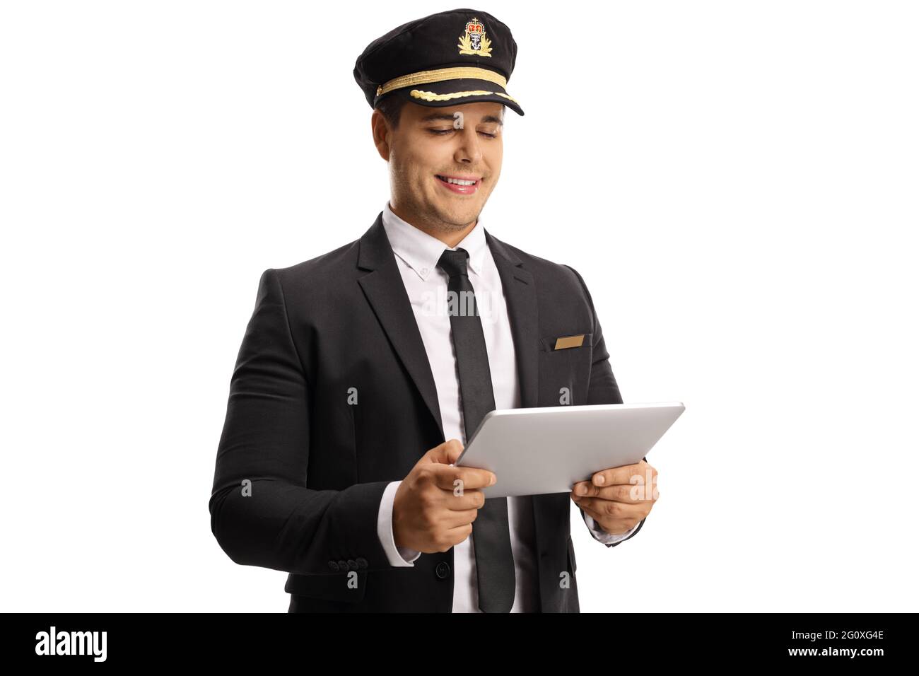 Young chauffeur using a digital tablet isolated on white background Stock Photo