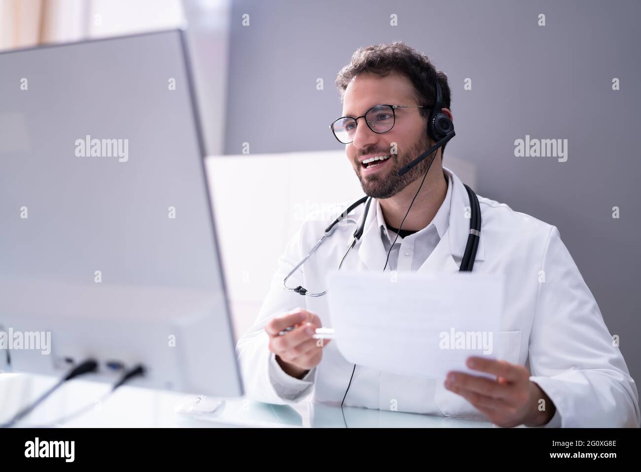 Doctor Online Consult Video Call On Computer Stock Photo