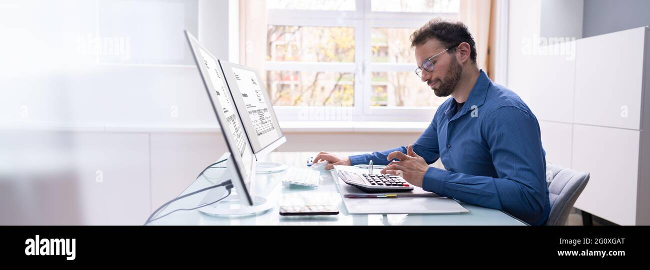 Bookkeeper Accountant Calculating Tax Invoice On Office Computer Stock ...