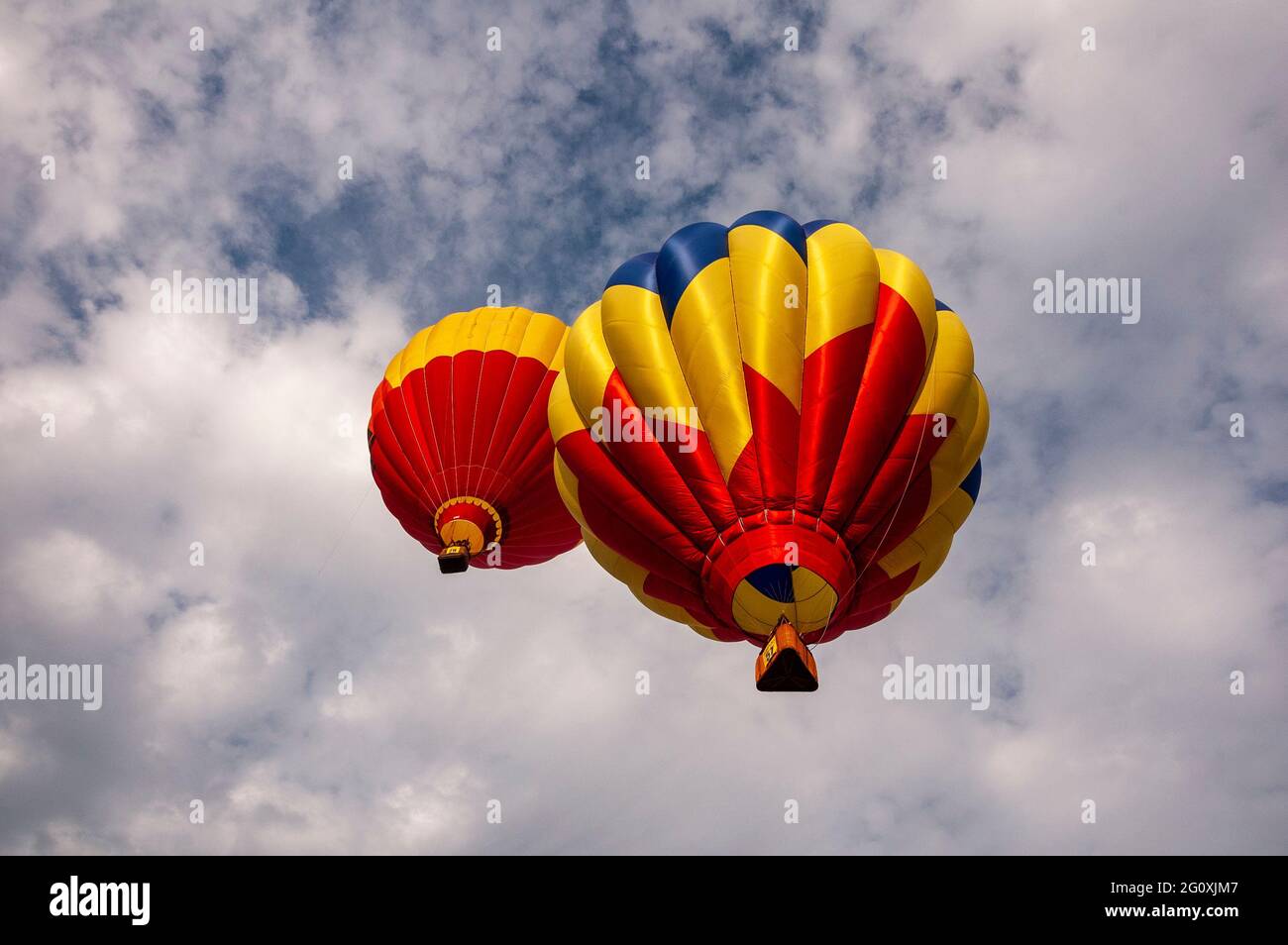 A pair of hot air balloons float above Indianola, Iowa Stock Photo - Alamy