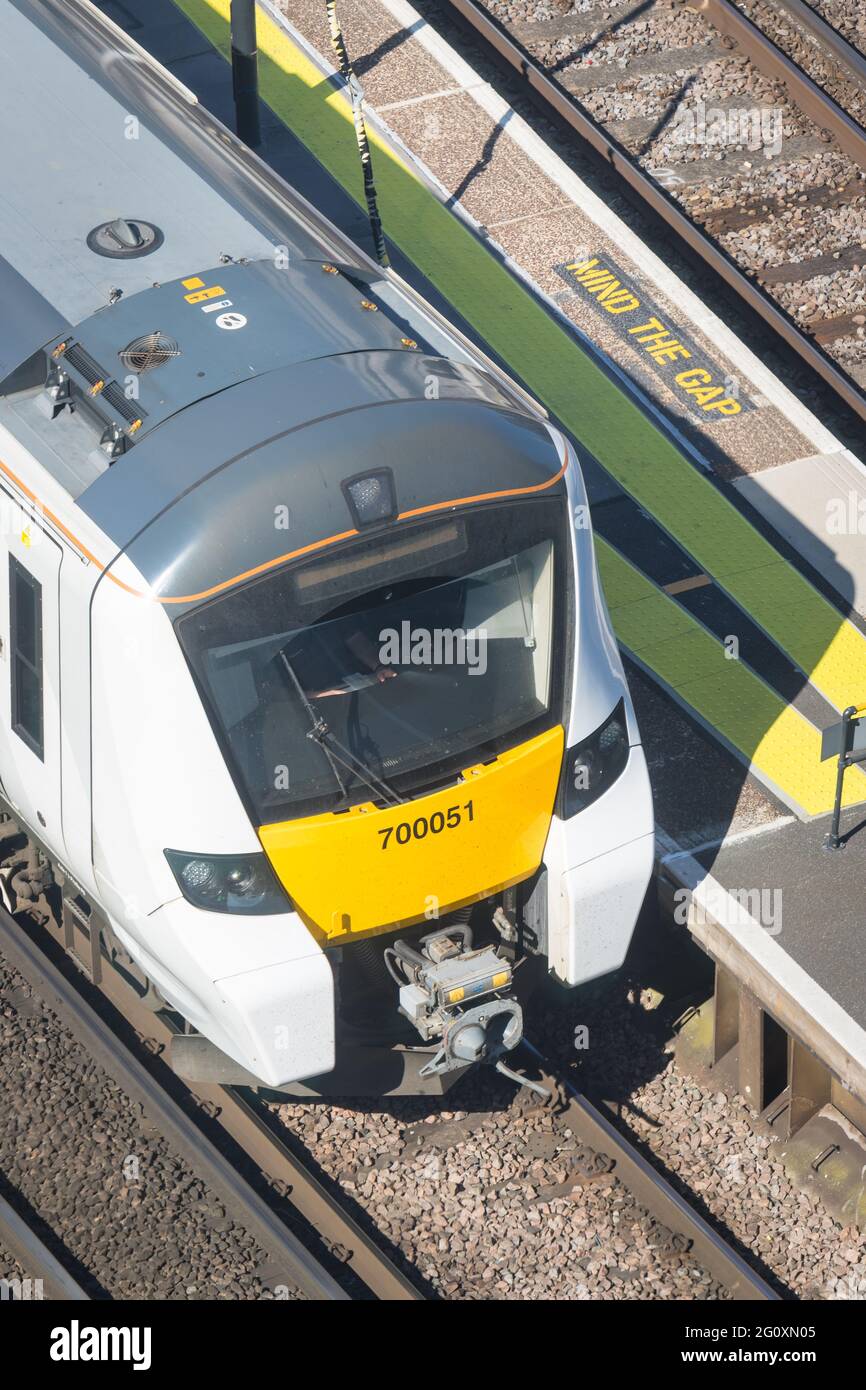 Thameslink train standing at a platform viewed from above Stock Photo