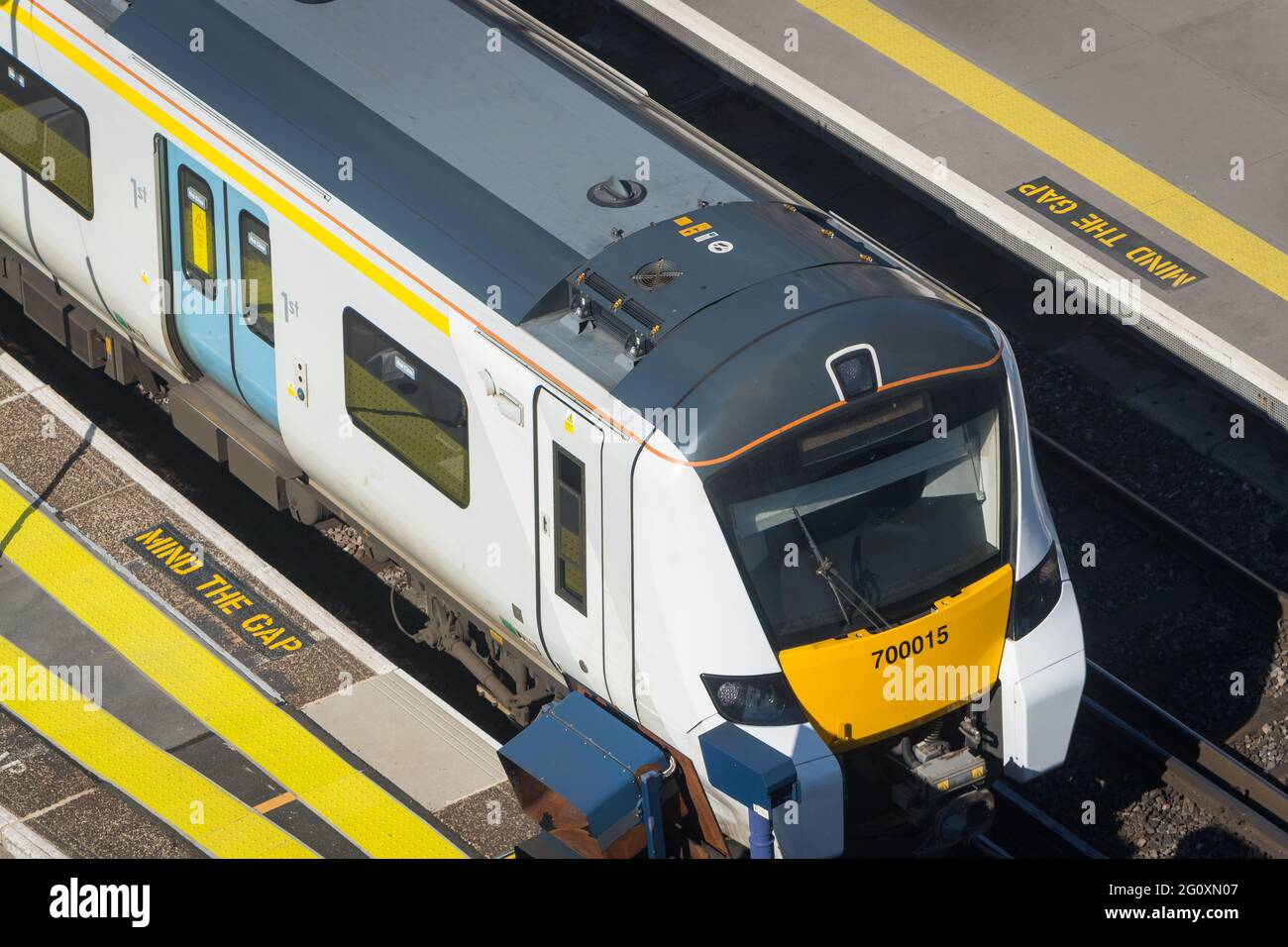 Thameslink train standing at a platform viewed from above Stock Photo