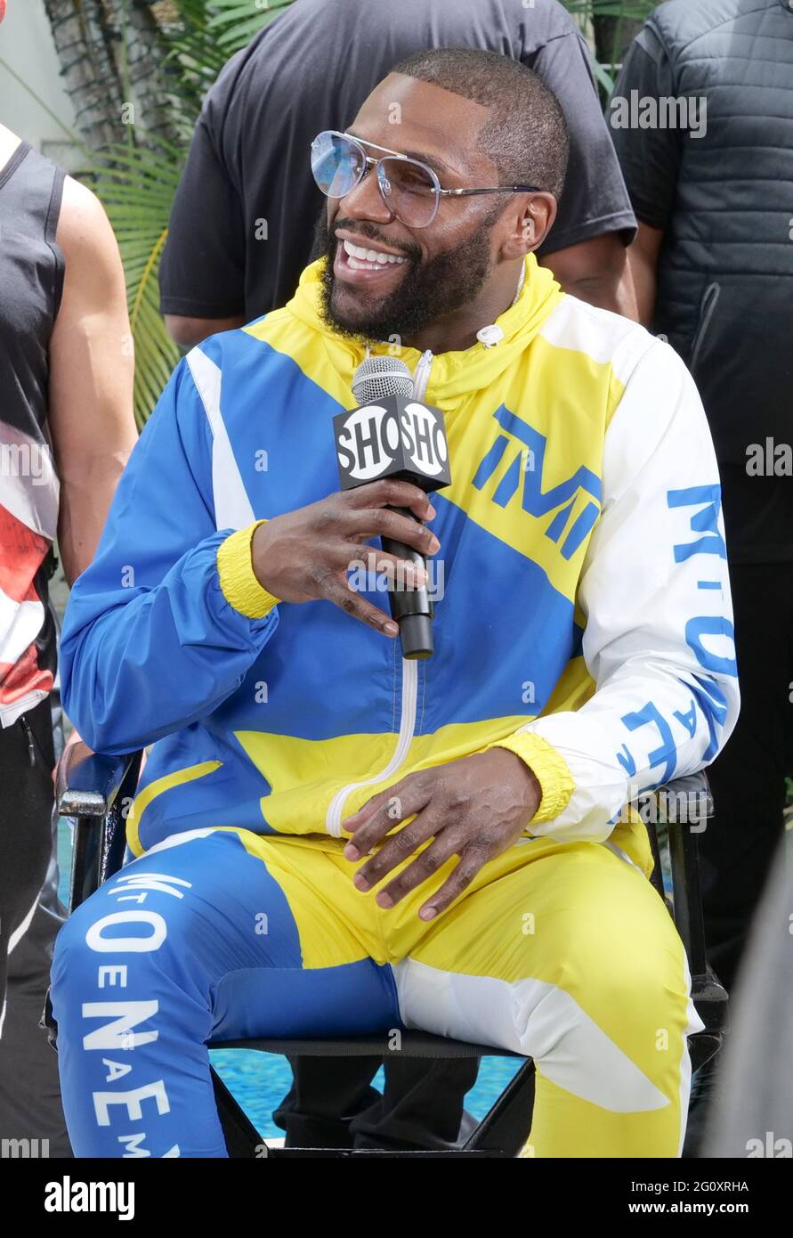 Miami Beach, United States. 03rd June, 2021. Floyd Mayweather (R) talks to the media during a press conference at the Villa Casa Casuarina the former Versace Mansion on Ocean Drive in Miami Beach, Florida, Thursday, June 3, 2021. Photo by Gary I Rothstein/UPI Credit: UPI/Alamy Live News Stock Photo