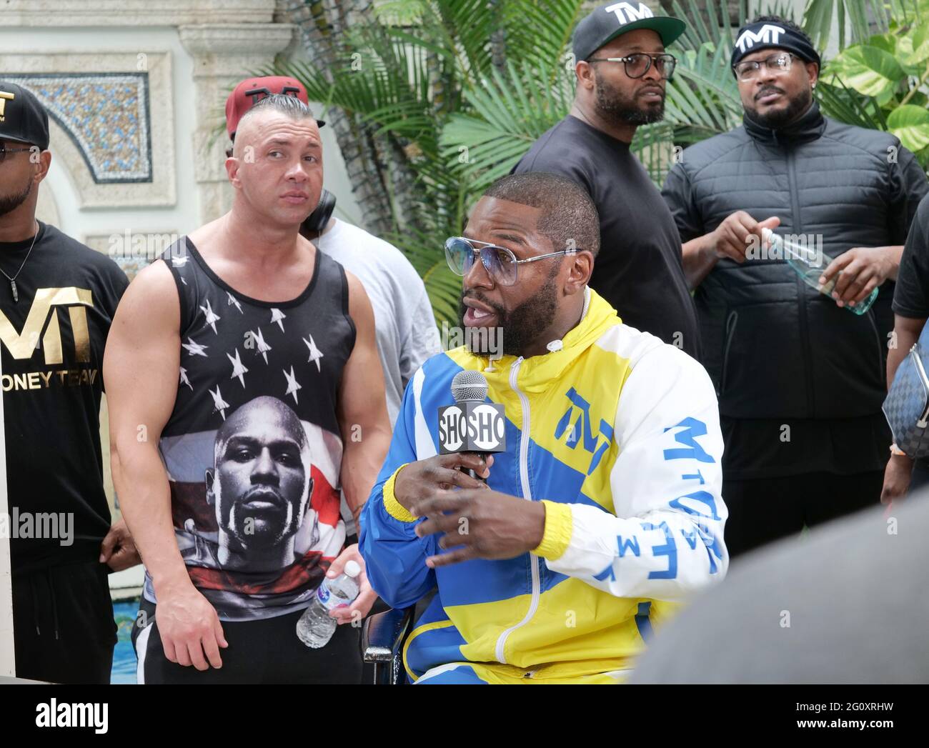 Miami Beach, United States. 03rd June, 2021. Floyd Mayweather (R) talks to the media during a press conference at the Villa Casa Casuarina the former Versace Mansion on Ocean Drive in Miami Beach, Florida, Thursday, June 3, 2021. Photo by Gary I Rothstein/UPI Credit: UPI/Alamy Live News Stock Photo