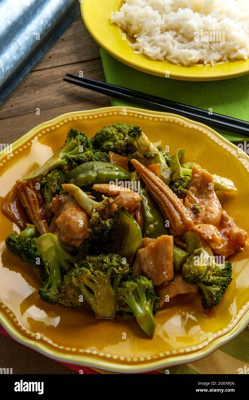 Chinese Hunan style spicy chicken with mixed sauteed vegetables and ...