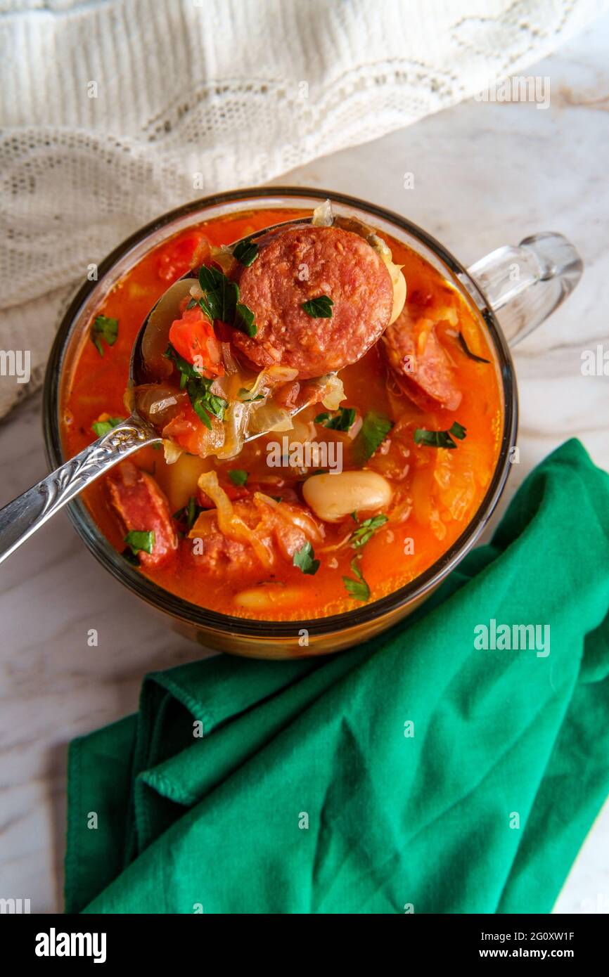 German kielbasa Oktoberfest stew with cabbage and sauerkraut Stock