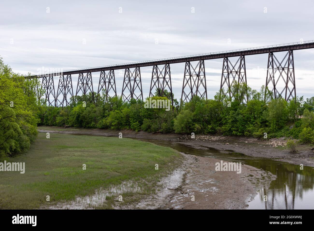 View of the Cap-Rouge railroad trestle bridge built in 1908 and the Cap ...