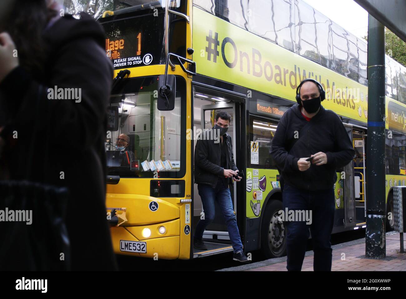 Wellington, New Zealand, 4 June 2021. Commuters get off a Metlink bus