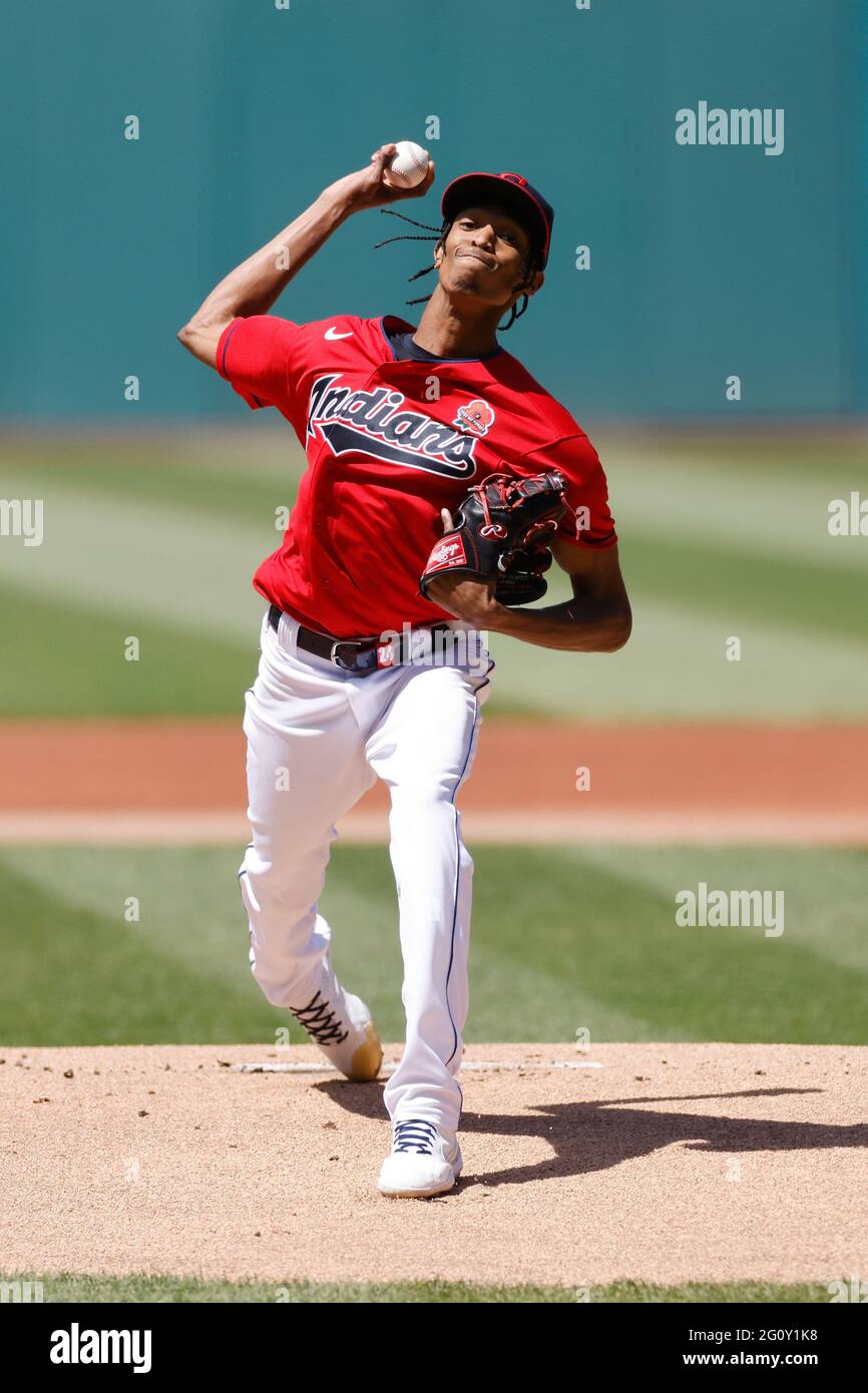 Download Caption: Cleveland Guardians' Pitcher Triston McKenzie in Action  Wallpaper