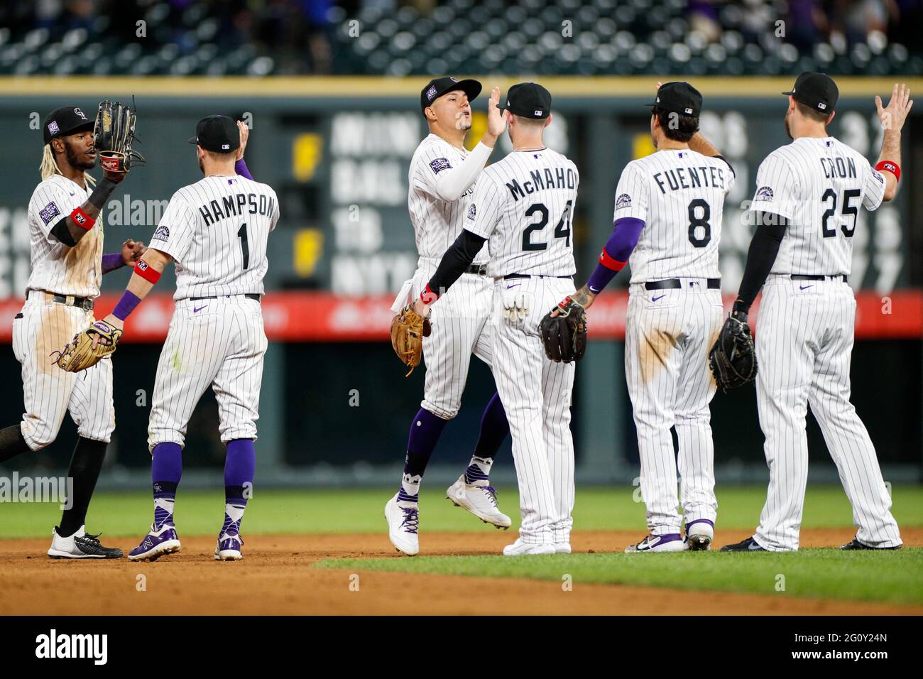Colorado Rockies players celebrate a victory during an MLB regular season game against the Texas Rangers, Wednesday, June 2nd, 2021, in Denver. (Brand Stock Photo