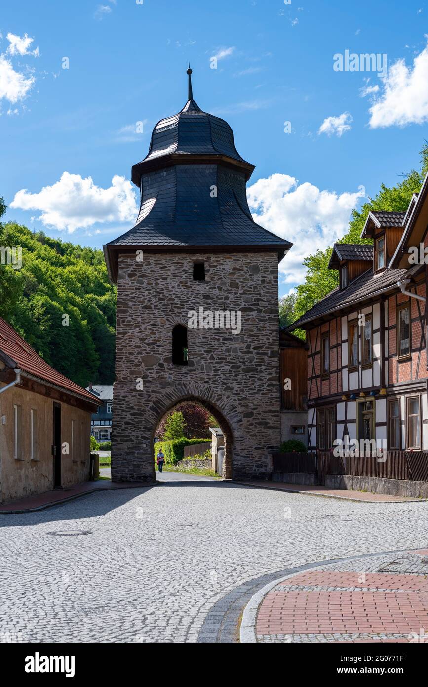 Stolberg, Germany. 24th May, 2021. The Knights' Gate at the entrance to the Old Town, built in the 13th century. Originally the gate was called 'Eselsgässer Tor' because food and other goods were transported from here on donkeys to the castle, which stands above the old town. It is part of the network 'Garden Dreams - Historical Parks in Saxony-Anhalt'. Credit: Stephan Schulz/dpa-Zentralbild/ZB/dpa/Alamy Live News Stock Photo