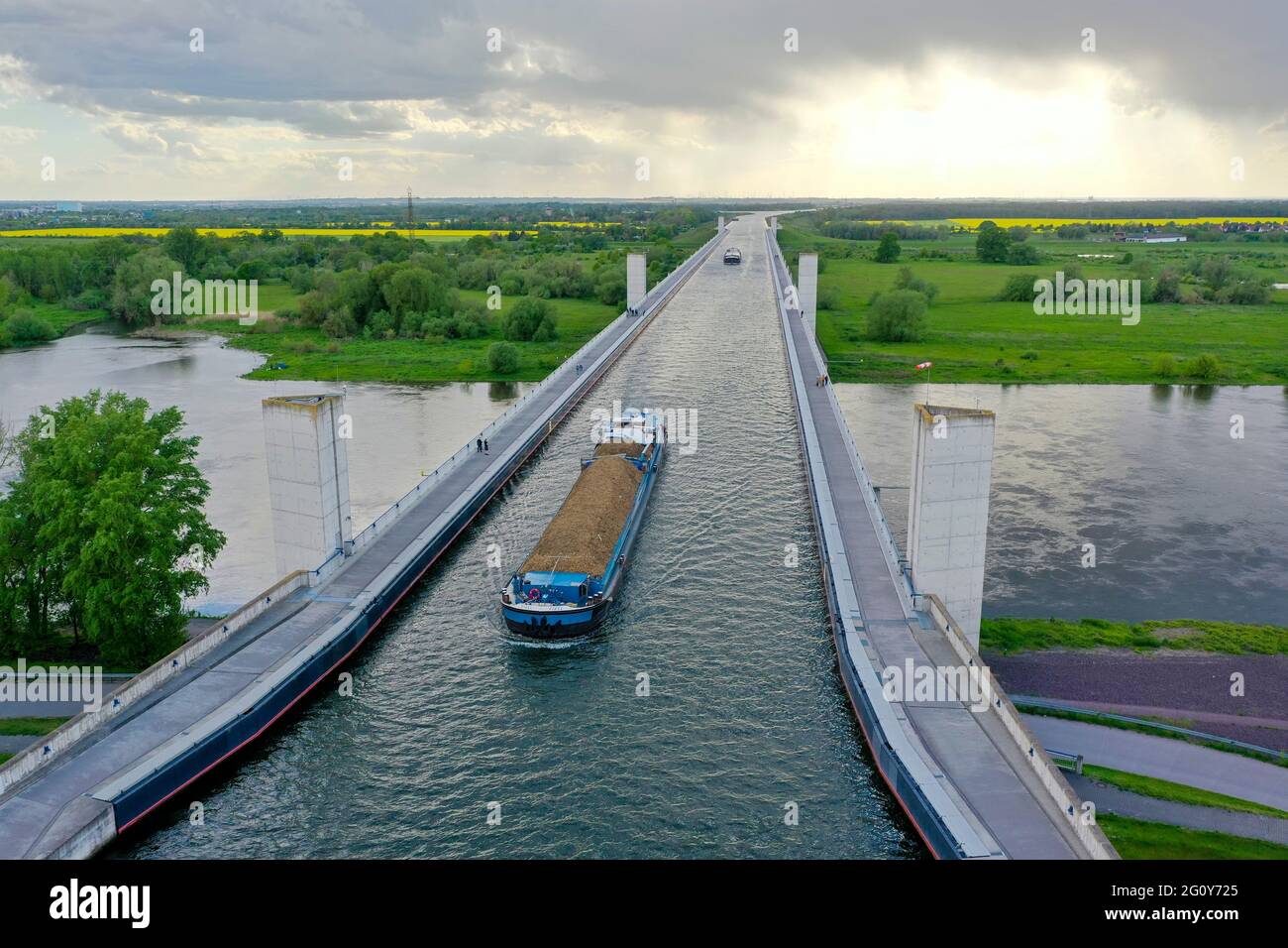 Magdeburg, Germany. 21st May, 2021. Two inland vessels cross the