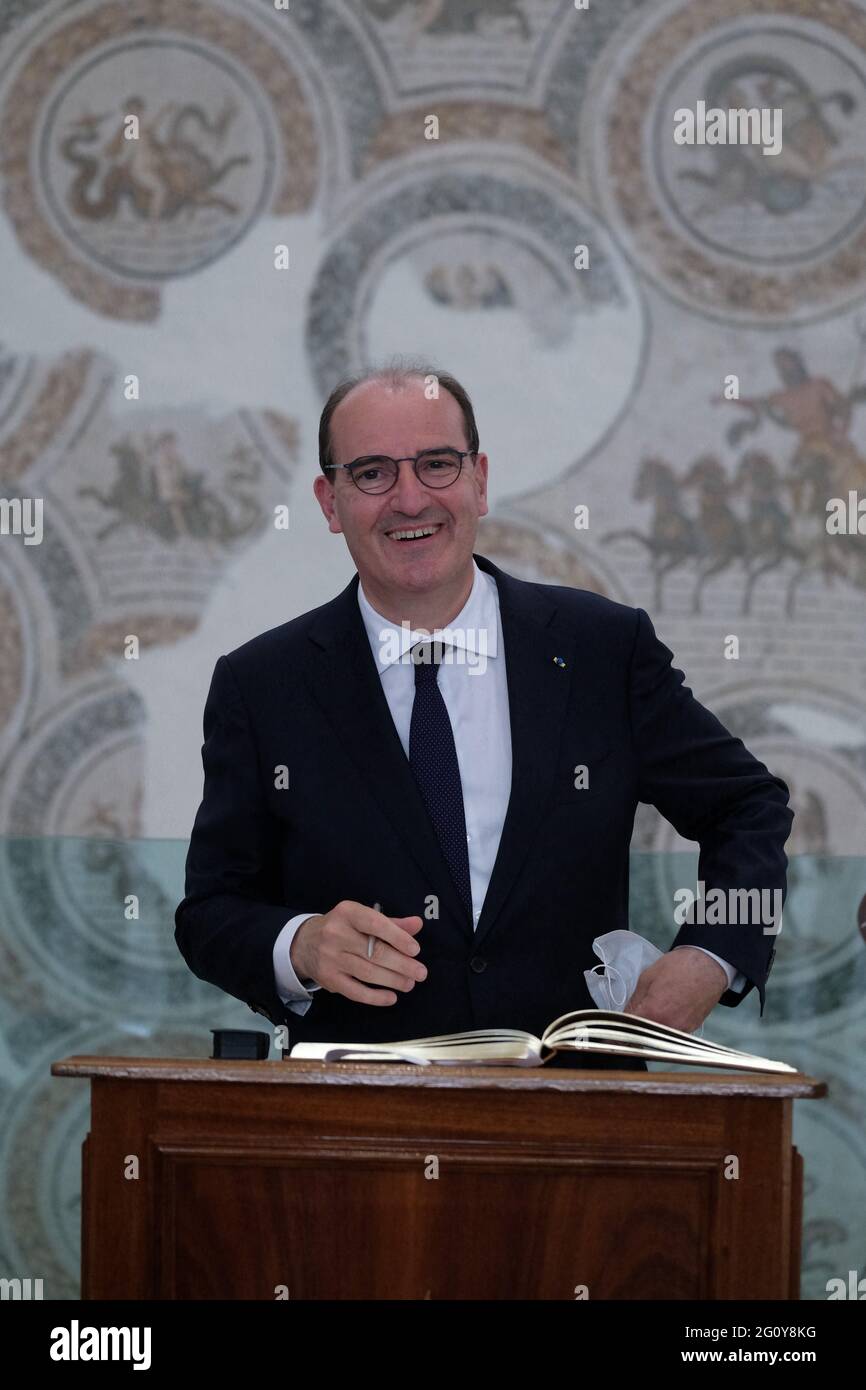 French Prime Minister Jean Castex signs the guest book at the Bardo ...