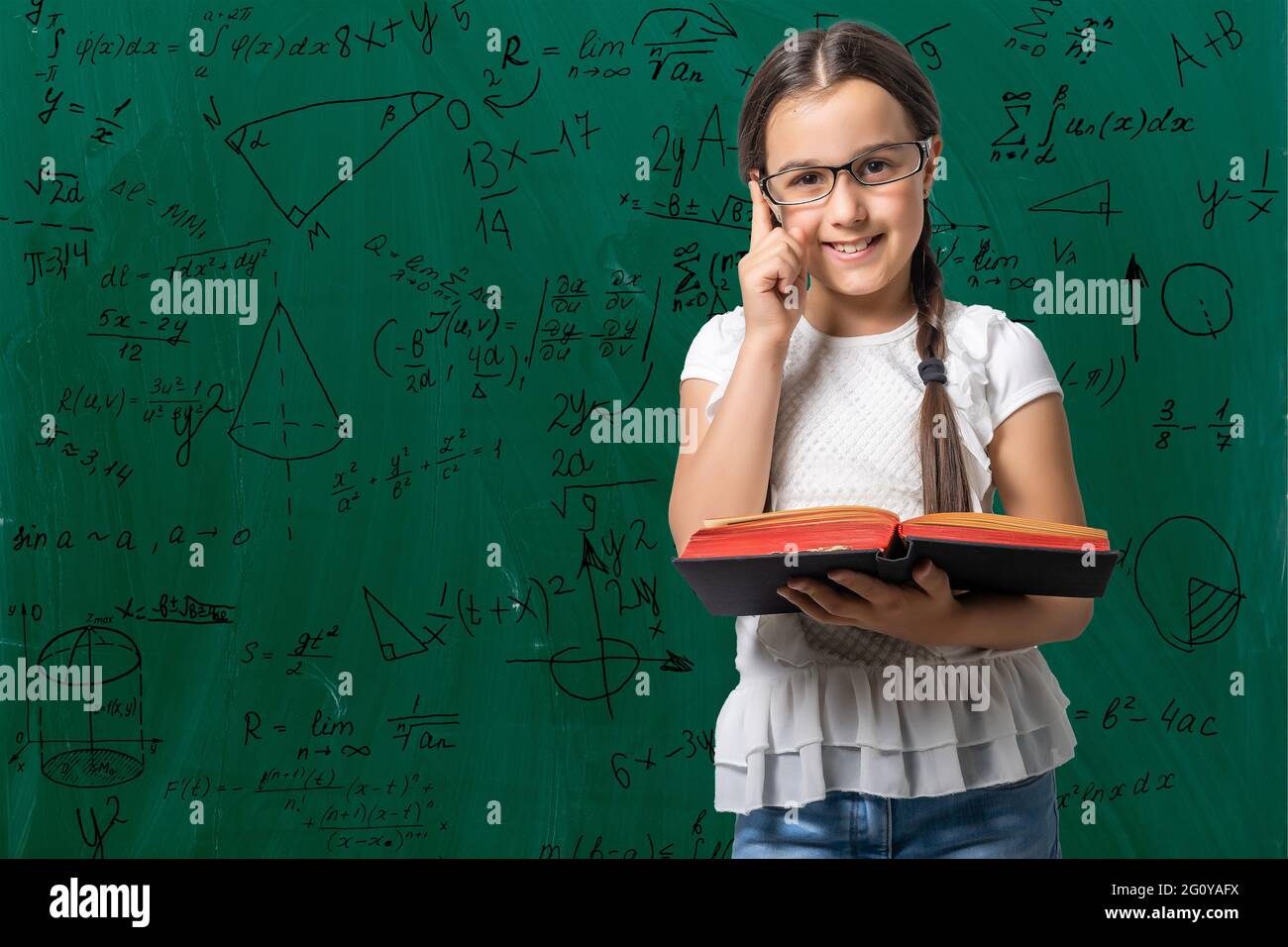 Portrait of a smiling little schoolgirl Stock Photo - Alamy
