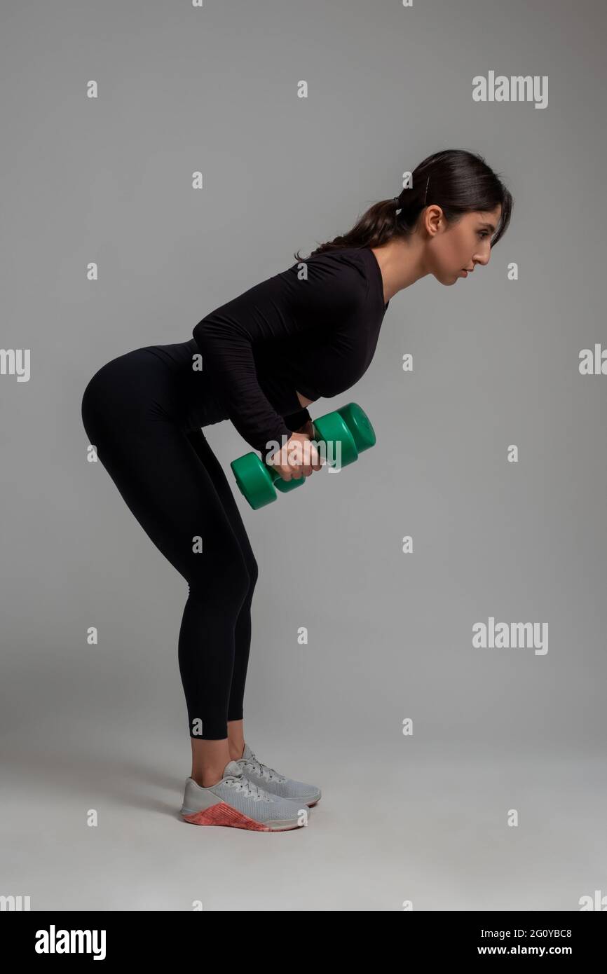 Standing Dumbbell Kickbacks